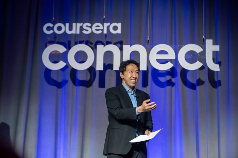 Coursera Co-founder Andrew Ng announces a Coursera award winner from the stage