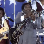 B.B. King Changes a Broken Guitar String Mid-Song at Farm Aid, and Doesn't Miss a Beat (1985)